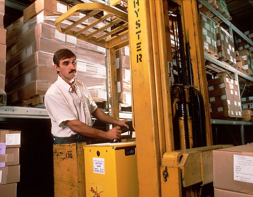 man driving a forklift