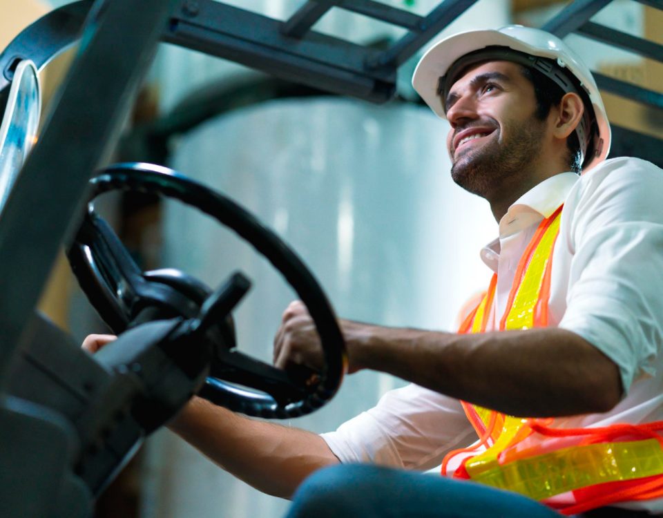 man driving a forklift